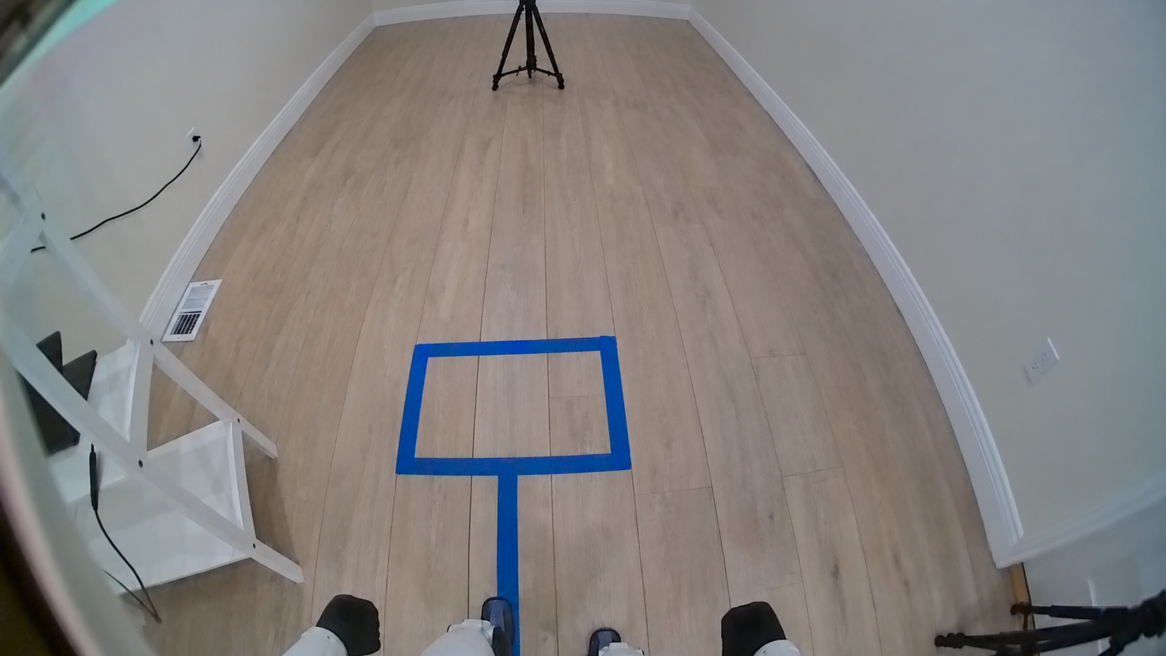 Downward view before the second move, with the feet short of the goal.